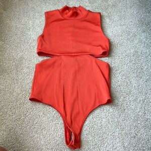 NBD orange ribbed Bodysuit